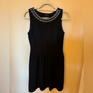 Black dress with beaded neckline detail